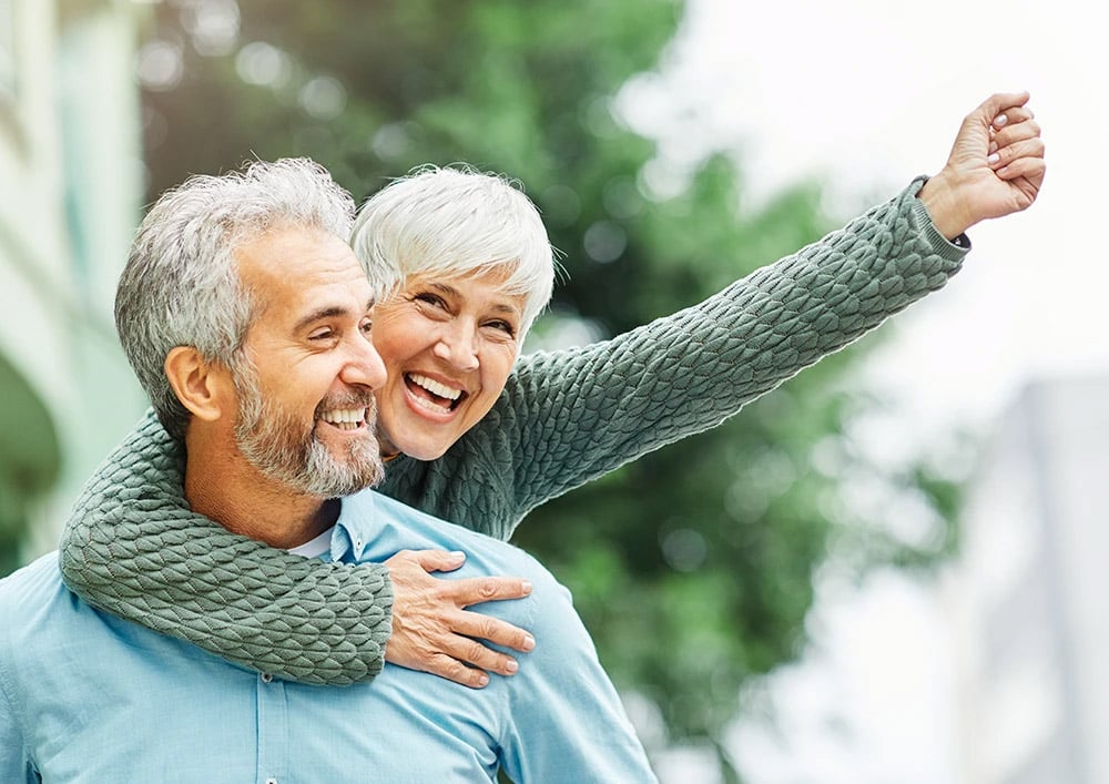 happy senior couple with beautiful smiles